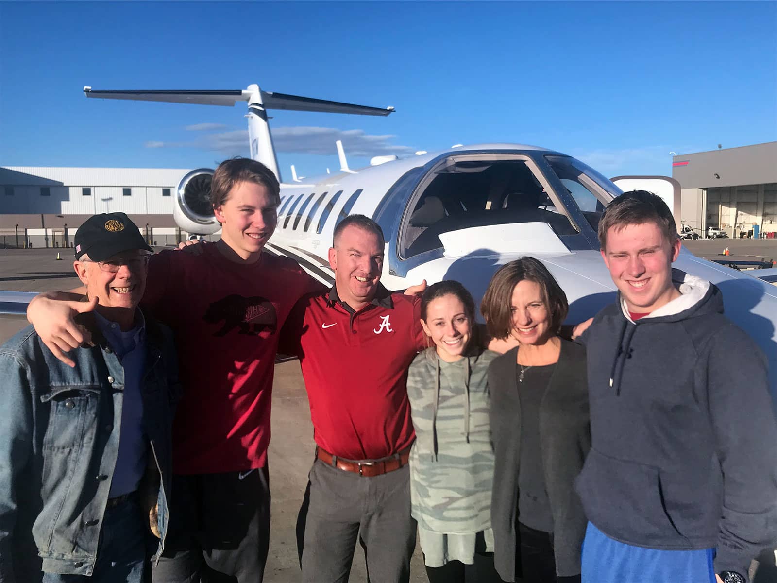 David with the Scott Family in front of a CJ3 after 3 years of flying