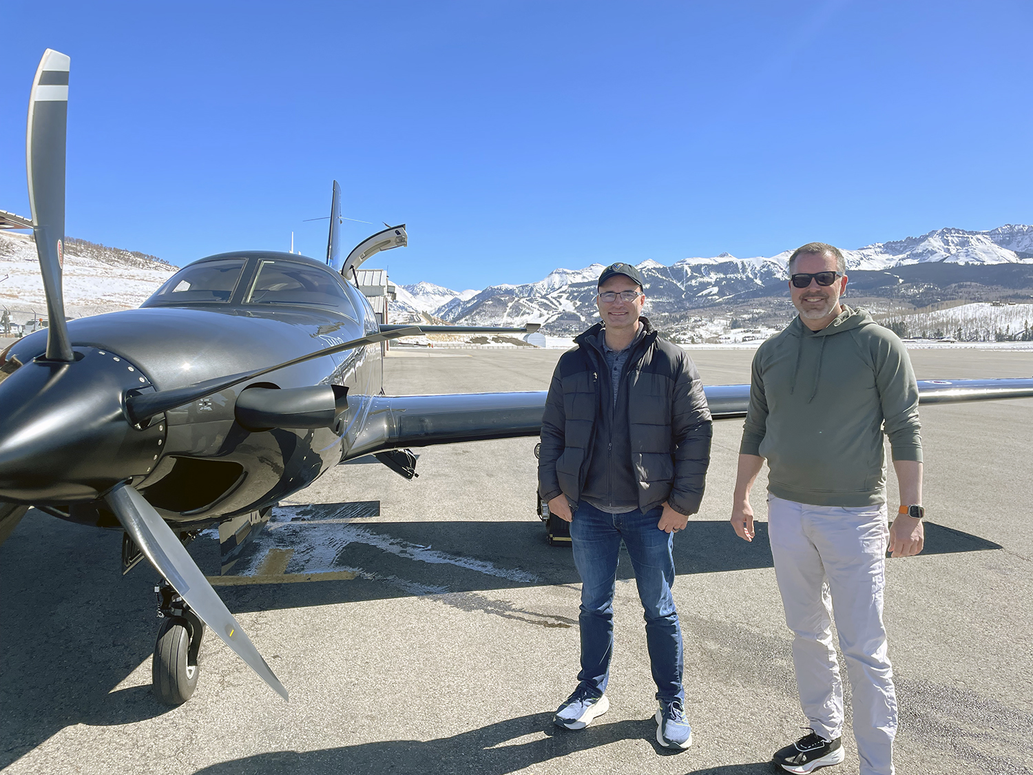 Pilot Stewart Albert and his business partner in front of his Piper M600 on the ramp during annual recurrent training